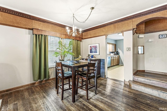 422 W Lawrence St, Mishawaka, IN 46545 - dining room with a chandelier, dark wood-style flooring, and healthy amount of natural light