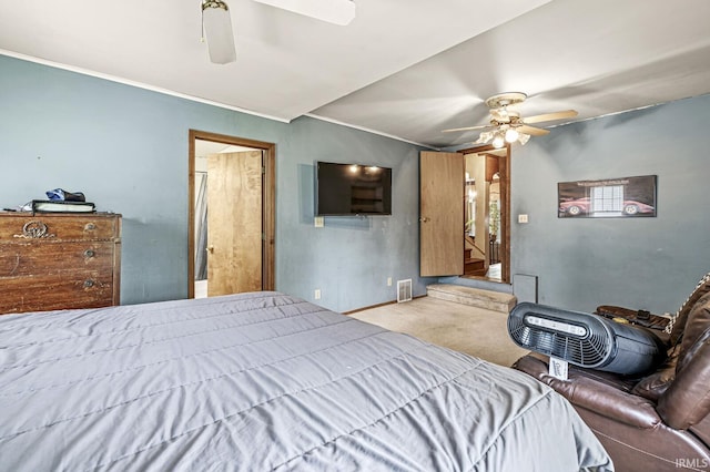 422 W Lawrence St, Mishawaka, IN 46545 - bedroom featuring carpet flooring, ornamental molding, and ceiling fan