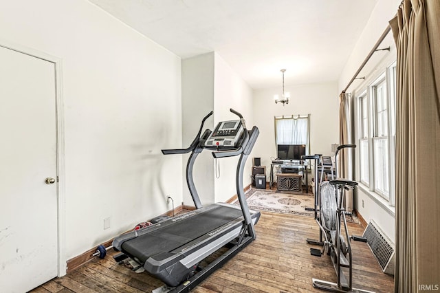 422 W Lawrence St, Mishawaka, IN 46545 - exercise area featuring hardwood / wood-style flooring and a chandelier