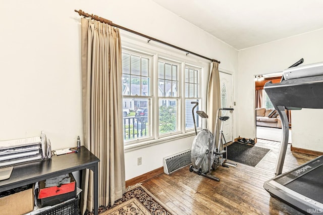 422 W Lawrence St, Mishawaka, IN 46545 - exercise room featuring wood-type flooring and baseboards