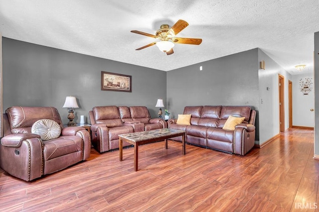 3317 Jacob Pl, Lafayette, IN 47909 - living room featuring ceiling fan, wood finished floors, and a textured ceiling