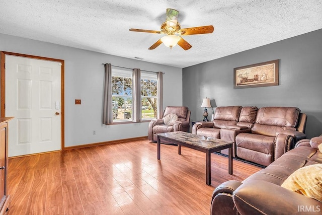 3317 Jacob Pl, Lafayette, IN 47909 - living room featuring ceiling fan, light wood-style flooring, and a textured ceiling