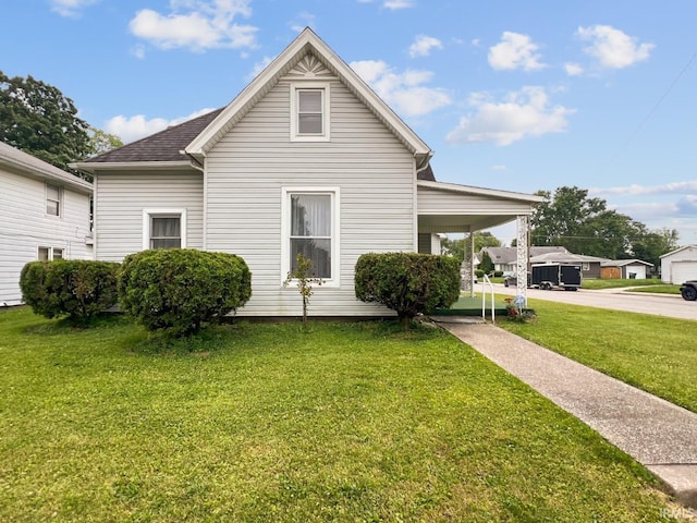 701 E N St, Kokomo, IN 46901 - view of front facade with a front lawn