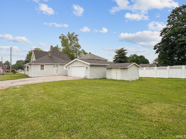 701 E N St, Kokomo, IN 46901 - view of front of property featuring a storage shed and driveway