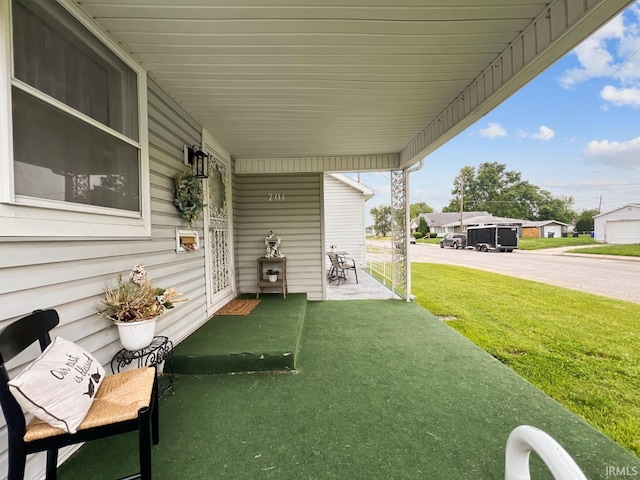 701 E N St, Kokomo, IN 46901 - porch featuring a yard