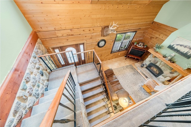 5618 N 725 E, Fremont, IN 46737 - living room featuring vaulted ceiling, wood walls, and wooden ceiling