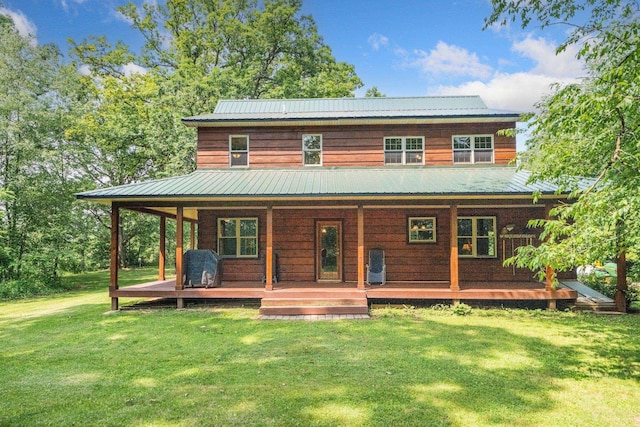 5618 N 725 E, Fremont, IN 46737 - rear view of house featuring a yard, covered porch, and a metal roof