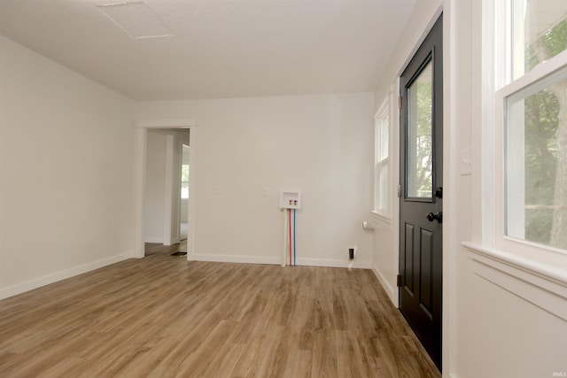 651 W Maple St, Wabash, IN 46992 - unfurnished room featuring light wood-type flooring and plenty of natural light