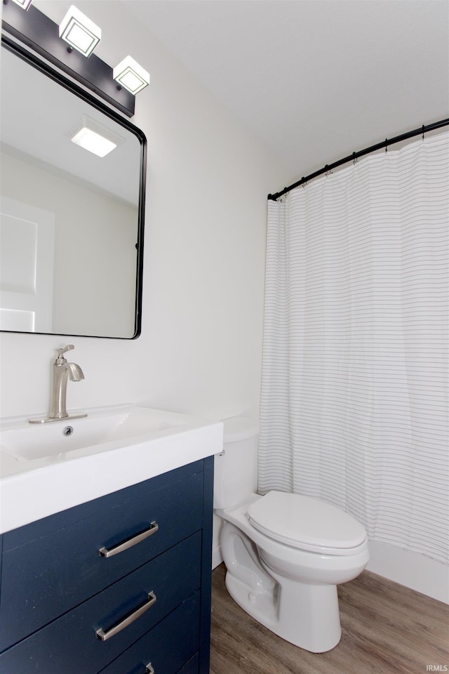 651 W Maple St, Wabash, IN 46992 - full bath featuring wood finished floors and vanity