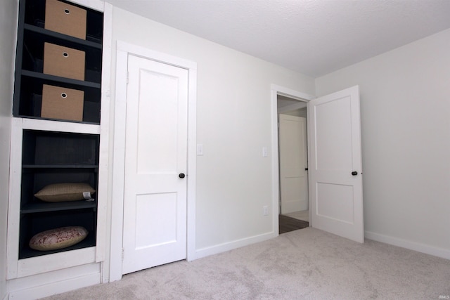 651 W Maple St, Wabash, IN 46992 - unfurnished bedroom with carpet and baseboards