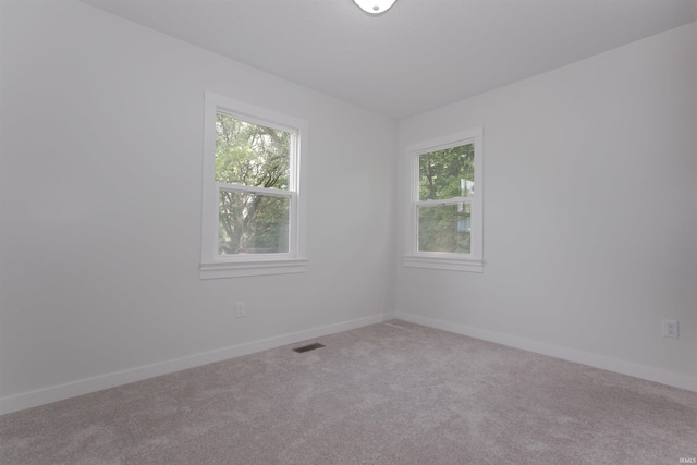 651 W Maple St, Wabash, IN 46992 - unfurnished room with plenty of natural light and carpet flooring
