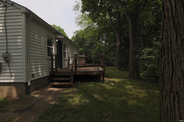 651 W Maple St, Wabash, IN 46992 - view of green lawn with a wooden deck