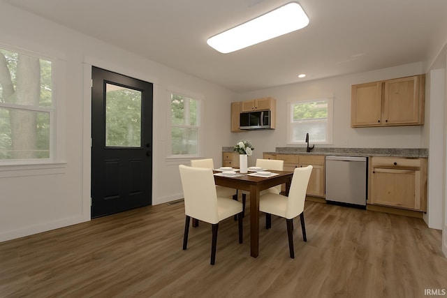 651 W Maple St, Wabash, IN 46992 - dining space with light wood finished floors and recessed lighting