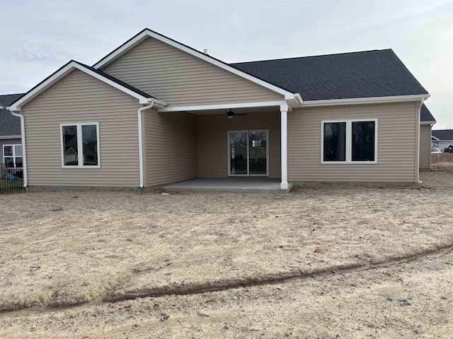 1544 Cananea Way, Fort Wayne, IN 46845 - rear view of house featuring a ceiling fan, a patio area, and roof with shingles