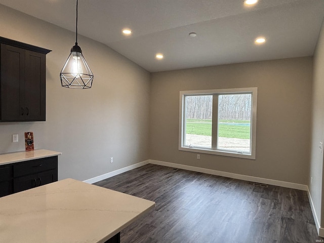 1544 Cananea Way, Fort Wayne, IN 46845 - unfurnished dining area with dark wood-style flooring and recessed lighting