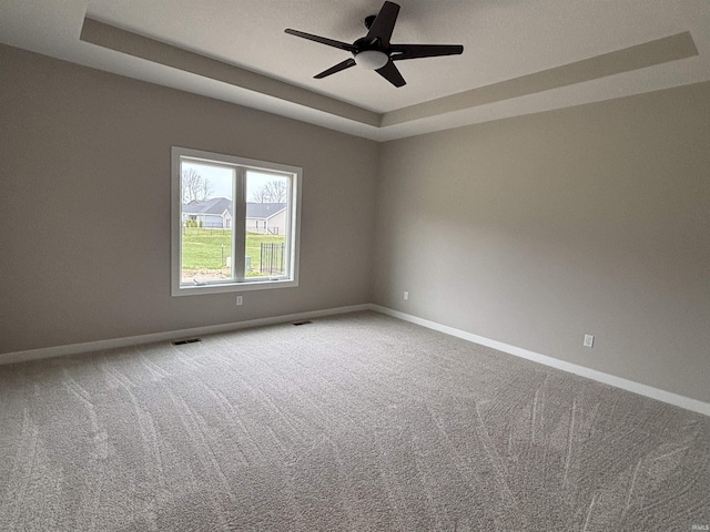 1544 Cananea Way, Fort Wayne, IN 46845 - unfurnished room featuring a tray ceiling, carpet floors, and ceiling fan