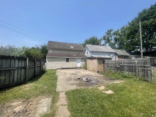 1210 Liberty St, Logansport, IN 46947 - back of house featuring a patio area and a shed