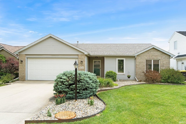 9536 Ballymore Dr, Fort Wayne, IN 46835 - single story home with brick siding, concrete driveway, a garage, and a front yard