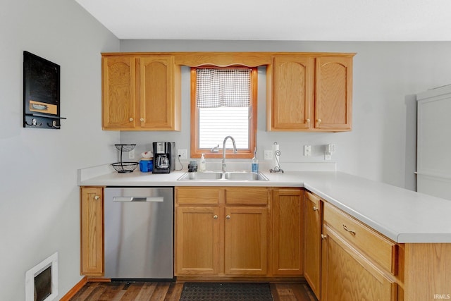 9536 Ballymore Dr, Fort Wayne, IN 46835 - kitchen featuring dishwasher, a peninsula, light countertops, and dark wood-style flooring