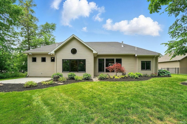 126 Tumbling Stone Ct, Fort Wayne, IN 46845 - rear view of property featuring roof with shingles