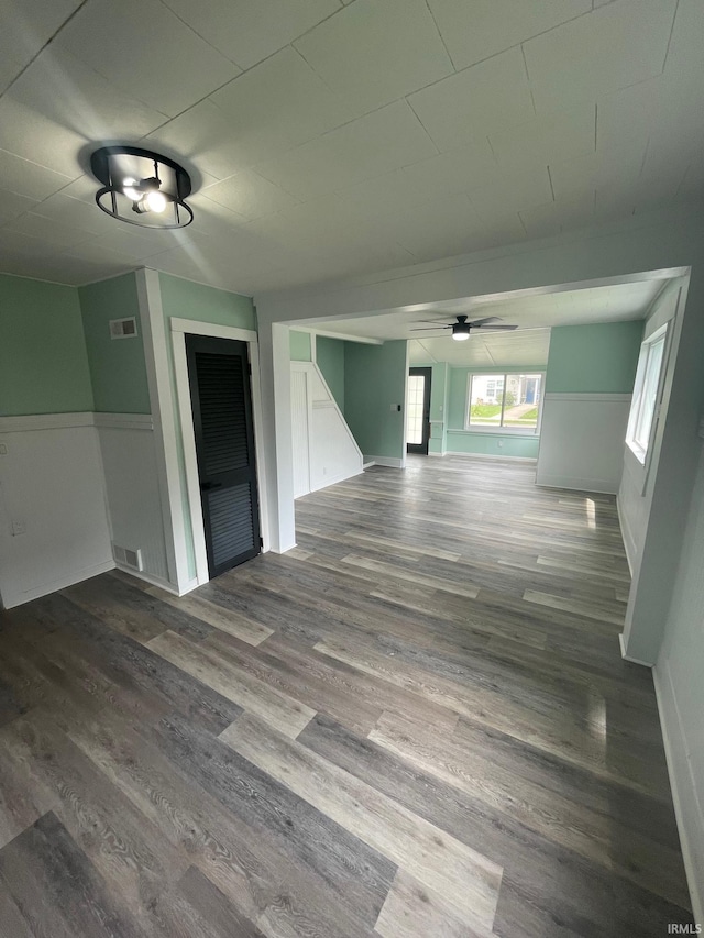 310 S Jefferson St, Bicknell, IN 47512 - empty room with wood finished floors and ceiling fan