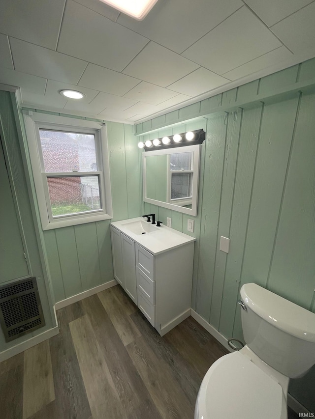 310 S Jefferson St, Bicknell, IN 47512 - bathroom with vanity and wood finished floors