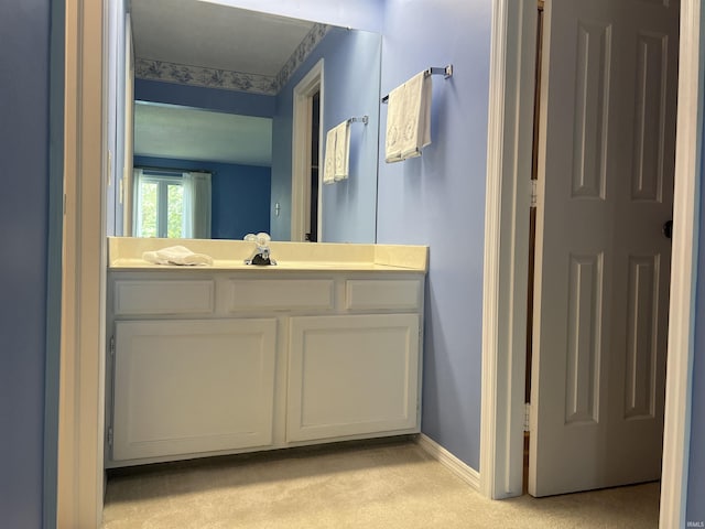 4501 N Wheeling Ave, Muncie, IN 47304 - bathroom with vanity and baseboards