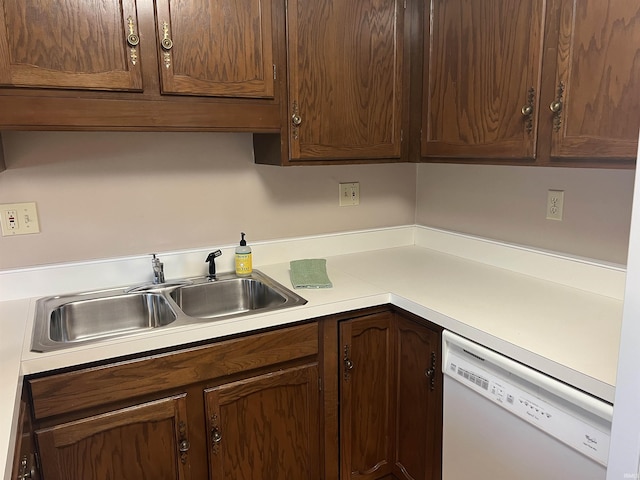 4501 N Wheeling Ave, Muncie, IN 47304 - kitchen featuring dishwasher, light countertops, and dark brown cabinetry
