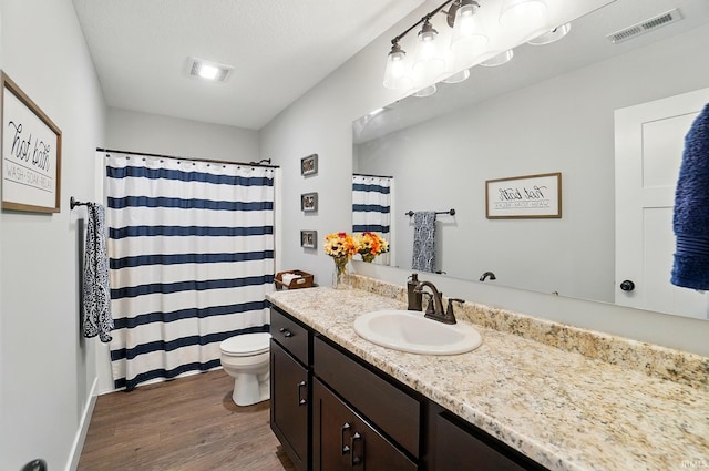 907 Switchfoot Dr, Huntertown, IN 46748 - full bath featuring vanity, wood finished floors, and a shower with curtain
