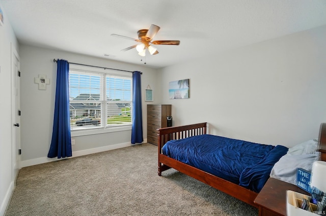 907 Switchfoot Dr, Huntertown, IN 46748 - carpeted bedroom featuring baseboards and a ceiling fan