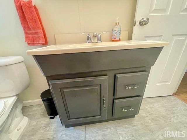 7210 W Dinsmore Rd, Bloomington, IN 47403 - bathroom with vanity and toilet