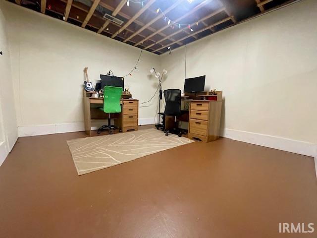 7210 W Dinsmore Rd, Bloomington, IN 47403 - office area with concrete flooring and baseboards