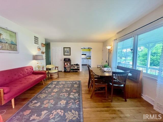7210 W Dinsmore Rd, Bloomington, IN 47403 - dining space featuring wood finished floors