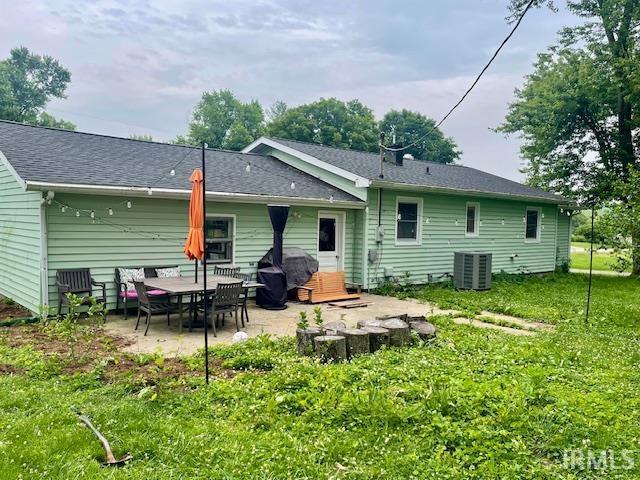 7210 W Dinsmore Rd, Bloomington, IN 47403 - back of house featuring a patio area