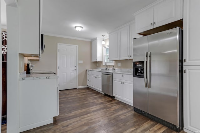 867 Park Plaza Dr, Evansville, IN 47715 - kitchen featuring appliances with stainless steel finishes, crown molding, dark wood-style flooring, white cabinets, and light countertops