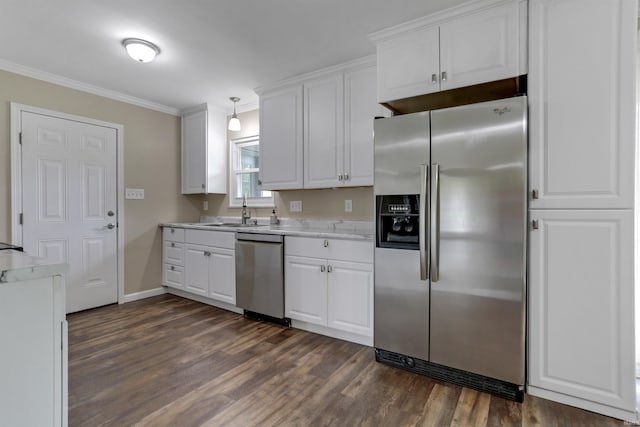 867 Park Plaza Dr, Evansville, IN 47715 - kitchen with appliances with stainless steel finishes, dark wood-style flooring, crown molding, light countertops, and white cabinetry