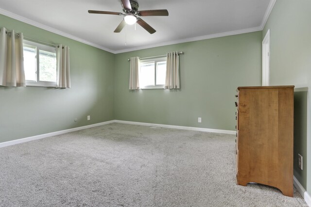 867 Park Plaza Dr, Evansville, IN 47715 - carpeted spare room with ceiling fan and ornamental molding