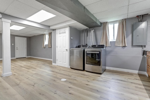 867 Park Plaza Dr, Evansville, IN 47715 - washroom with electric panel, independent washer and dryer, and light wood-type flooring