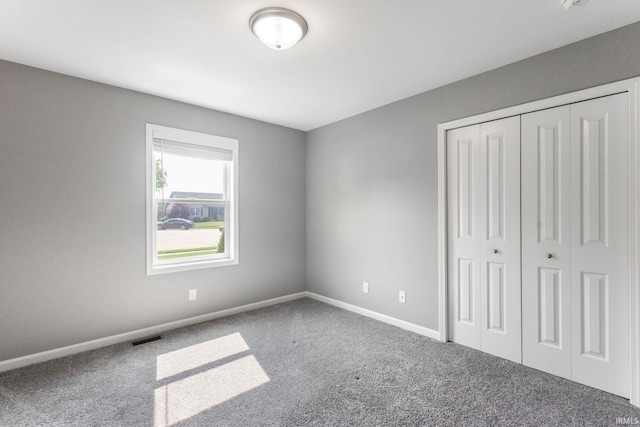 509 Janewood Ct, Goshen, IN 46526 - unfurnished bedroom featuring carpet flooring and a closet