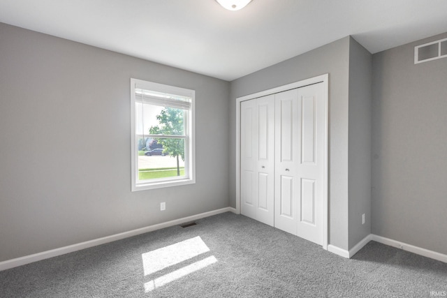 509 Janewood Ct, Goshen, IN 46526 - unfurnished bedroom featuring carpet floors and a closet