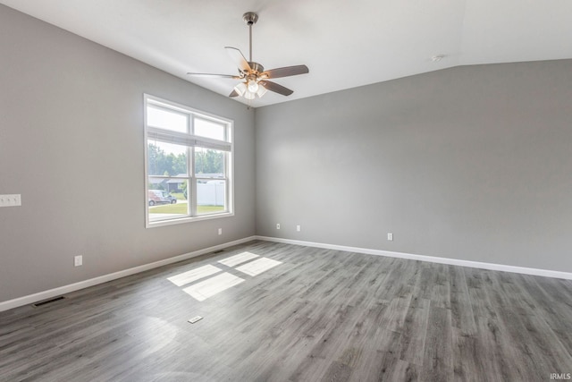 509 Janewood Ct, Goshen, IN 46526 - unfurnished room with ceiling fan, wood finished floors, and lofted ceiling