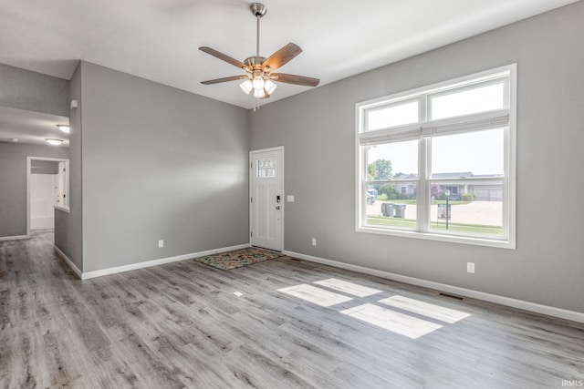 509 Janewood Ct, Goshen, IN 46526 - empty room featuring wood finished floors and ceiling fan