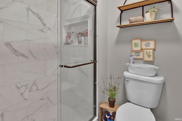 207 Meadows Dr, Greentown, IN 46936 - full bathroom featuring toilet and a marble finish shower
