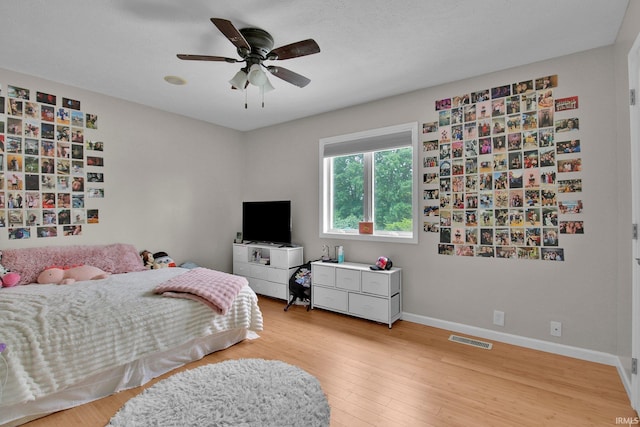 207 Meadows Dr, Greentown, IN 46936 - bedroom featuring wood finished floors and ceiling fan