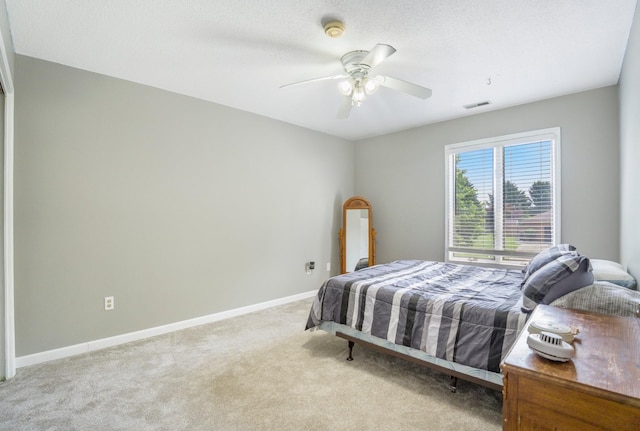 1006 Heather Rdg, Angola, IN 46703 - bedroom featuring light colored carpet and a ceiling fan