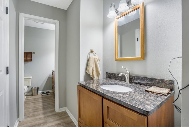 1006 Heather Rdg, Angola, IN 46703 - half bathroom with vanity and wood finished floors