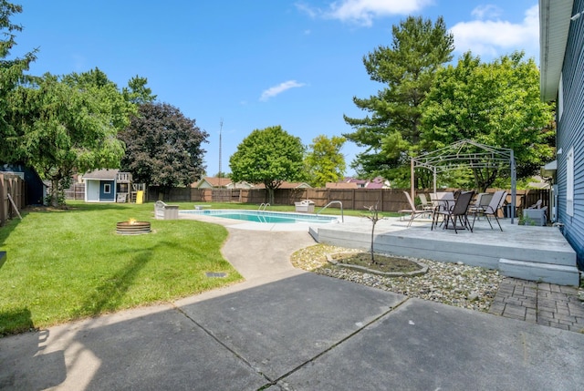 1006 Heather Rdg, Angola, IN 46703 - view of pool with a gazebo, a fenced backyard, an outdoor fire pit, and an outbuilding