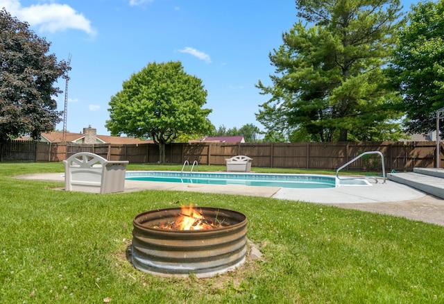 1006 Heather Rdg, Angola, IN 46703 - view of swimming pool featuring a fenced backyard and a fire pit