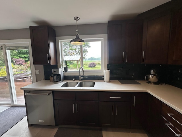 32131 State Road 2nd Rd, New Carlisle, IN 46552 - kitchen featuring dishwasher, light countertops, decorative backsplash, and pendant lighting