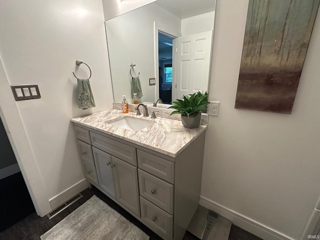 32131 State Road 2nd Rd, New Carlisle, IN 46552 - bathroom with vanity and baseboards